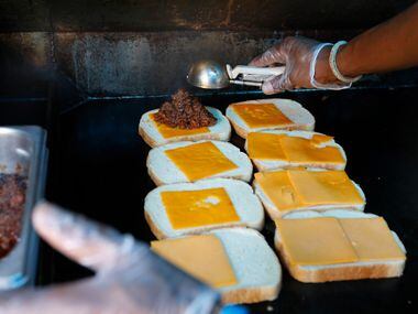 Berny Mayfield makes a grilled cheese sandwich with bbq brisket on sourdough bread in...