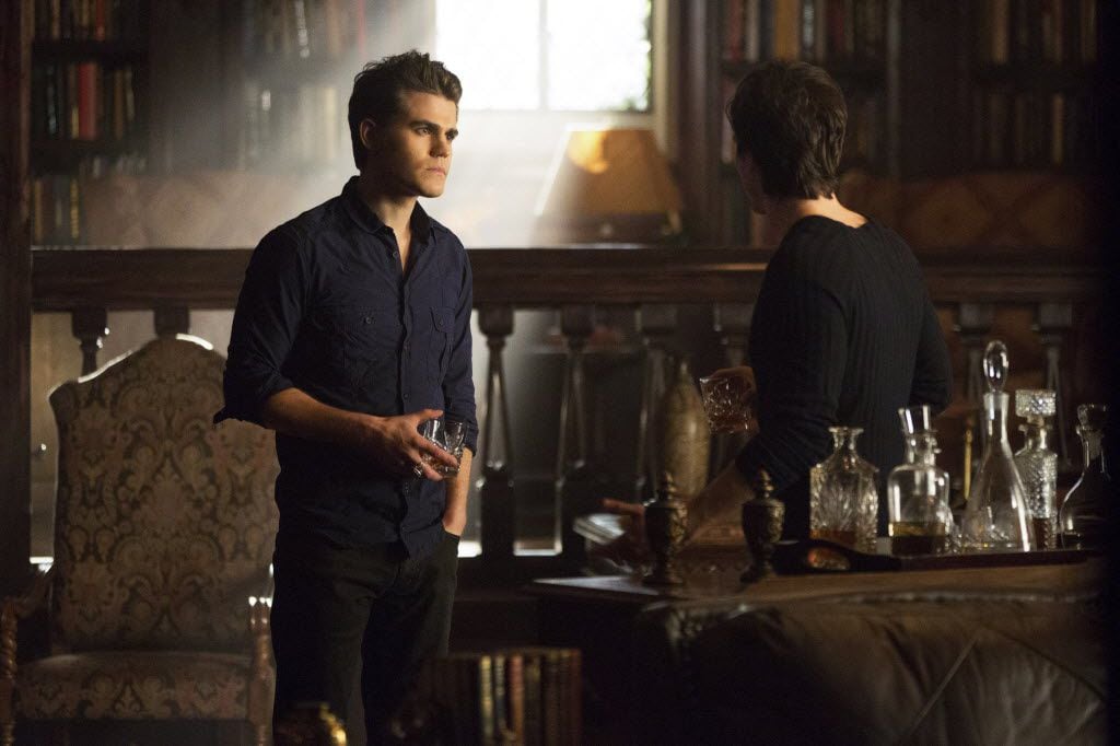 Paul Wesley, left, as Stefan and Ian Somerhalder as Damon, in a scene from Season 4 of "The...