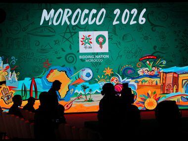 A giant screen displays the logo of Morocco 2026 inside of the reception before a press...