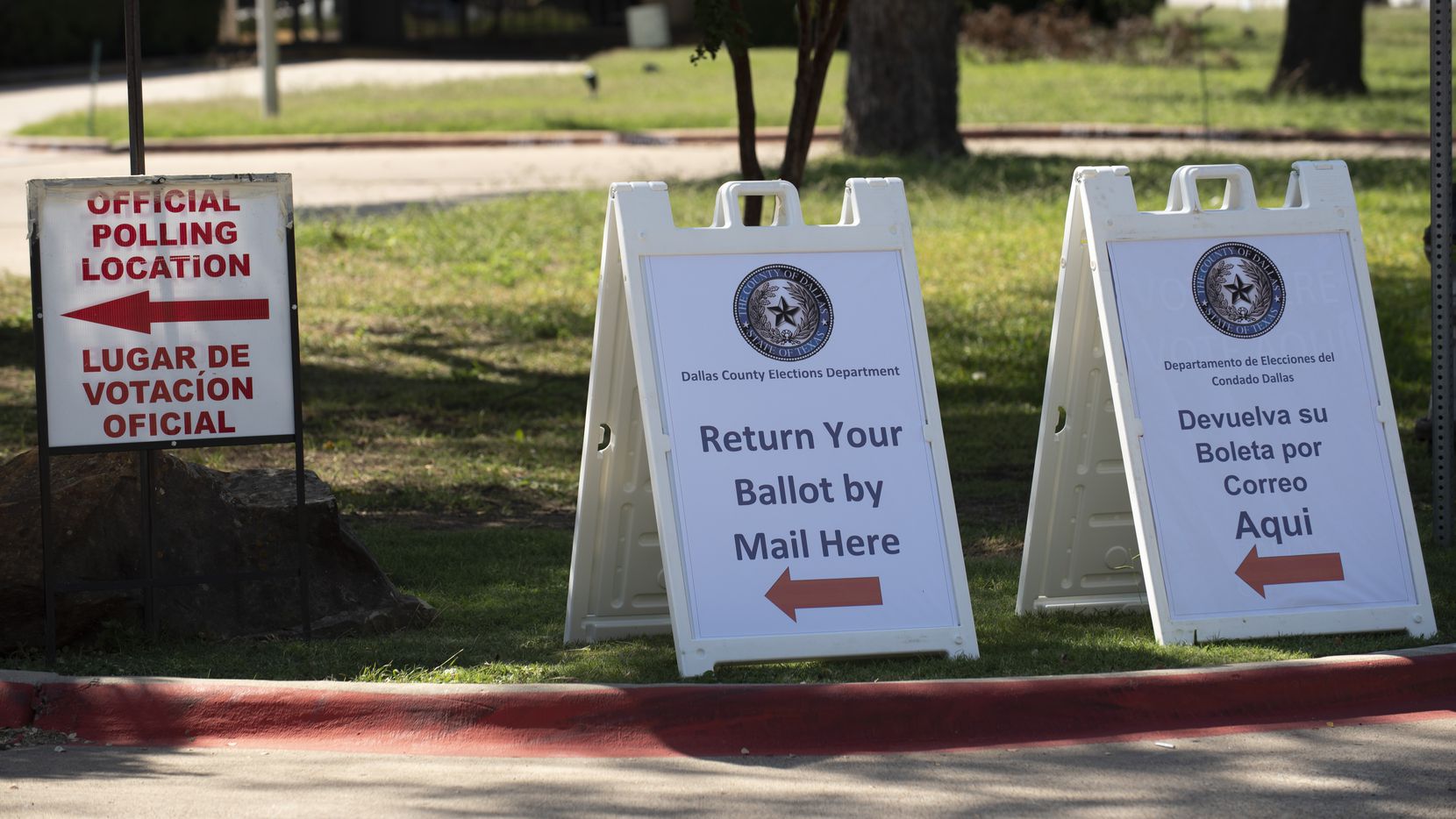 In this file photo, signage to vote at a polling location outside of the Dallas County...