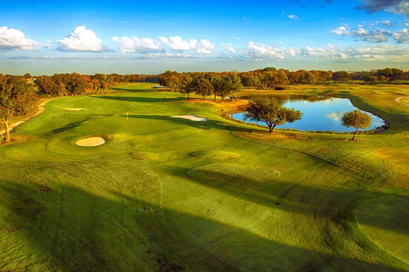 A view of the 585-yard par-5 No. 18 at the Golf Courses at Watters Creek in Allen from the...