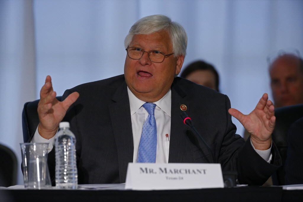 Congressman Kenny Marchant  asks questions during a hearing at DFW International Airport to...