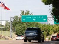 Traffic passes along Harry Hines Boulevard on Tuesday, Aug. 9, 2022.