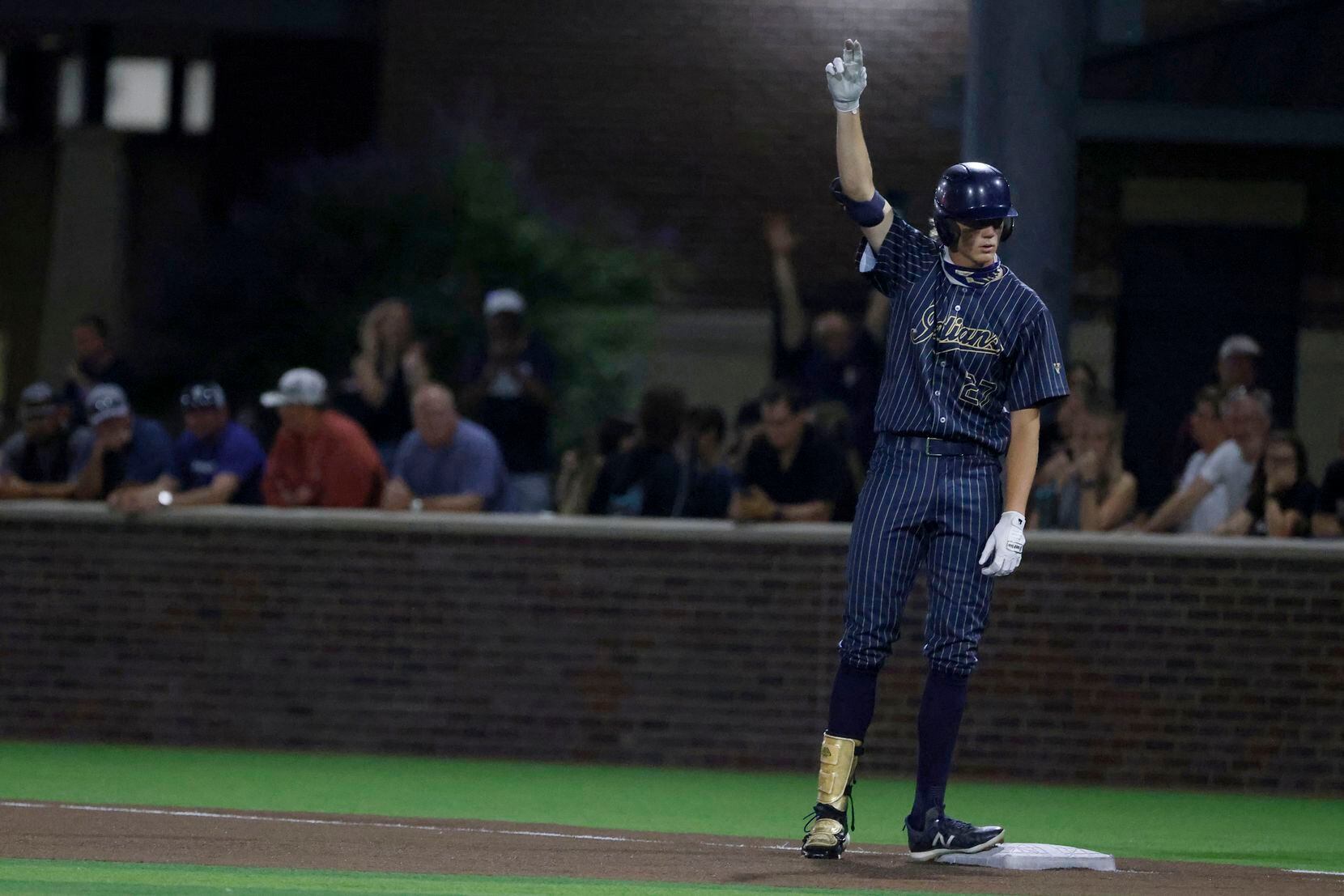 Keller’s Ty Zahradnik (27), reacts after hitting a single against Flower Mound Marcus that...