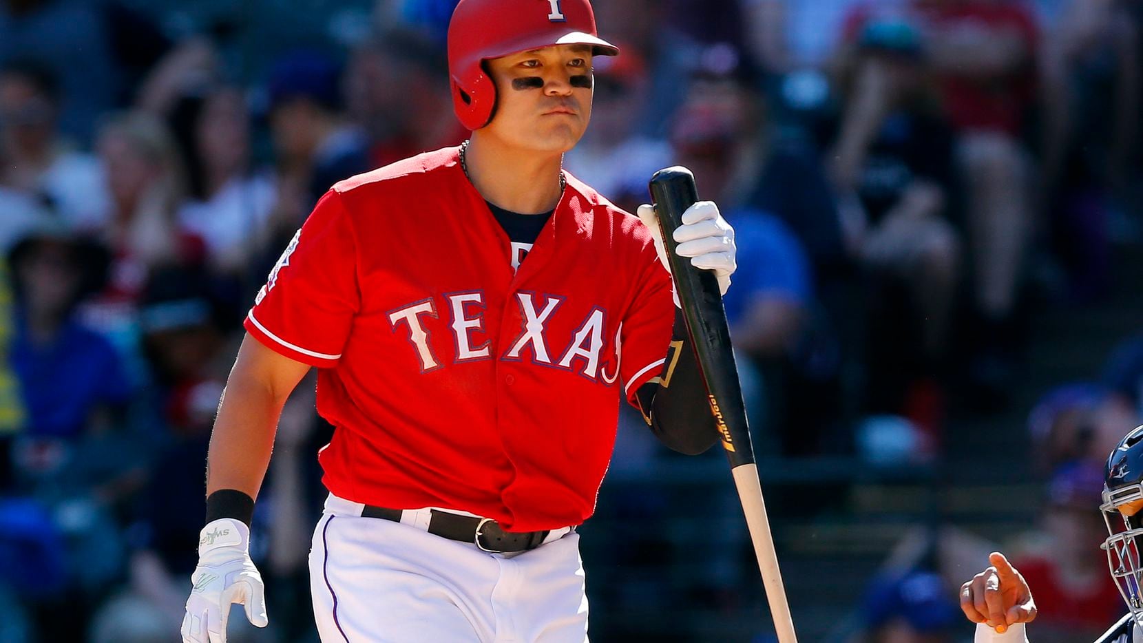 Texas Rangers batter Shin-Soo Choo (17) reacts at the plate as he bats in the eighth inning...