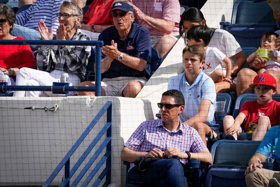 Texas Ranges president, baseball operations, Jon Daniels  watches an NCAA baseball game...