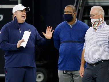 Cowboys head coach Mike McCarthy talks with vice president of player personnel Will McClay and executive vice president Stephen Jones during training camp at The Star in Frisco on Friday, Aug. 28, 2020.