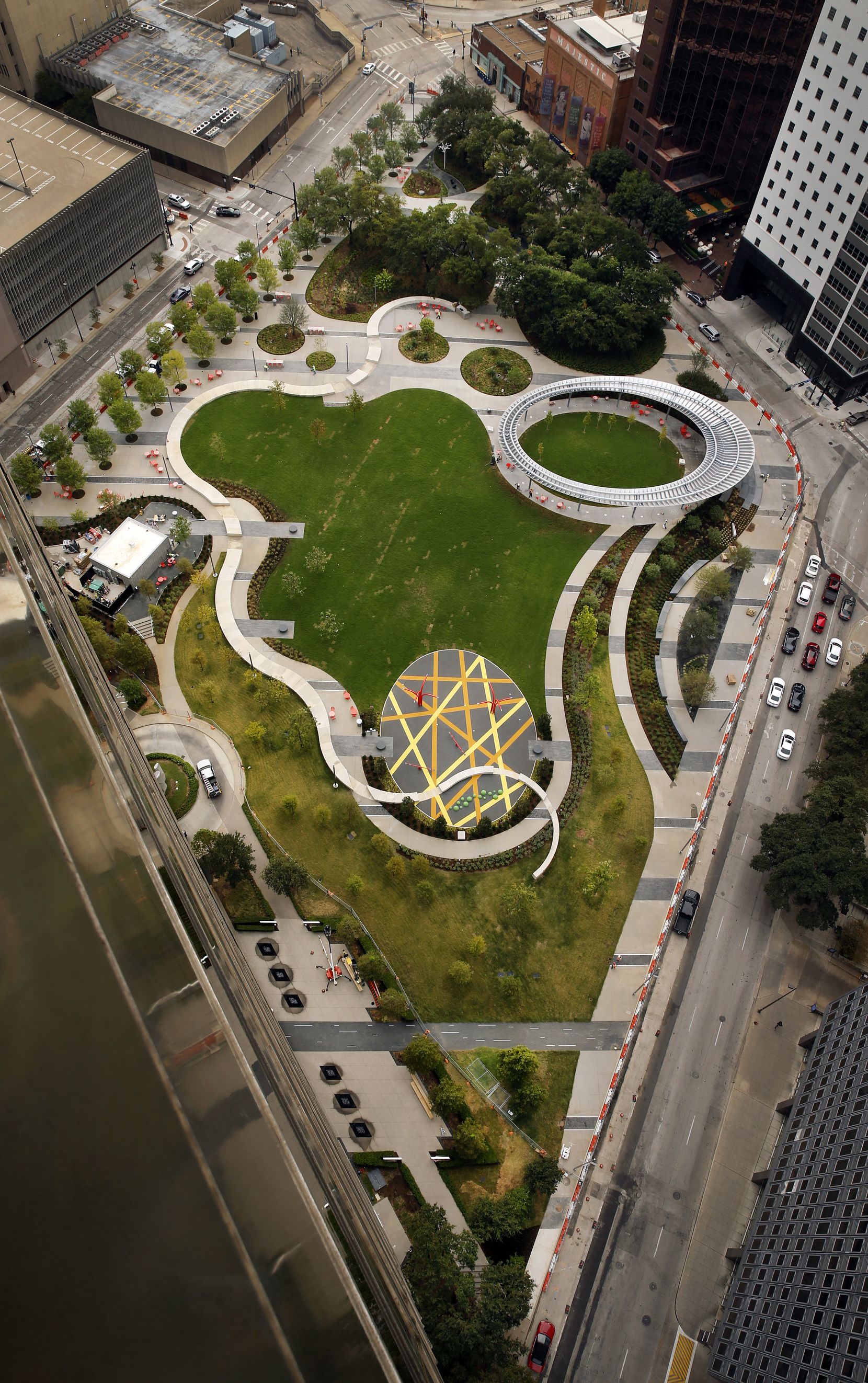 An overhead view of Pacific Plaza shows key features of the park. The play area (center,...