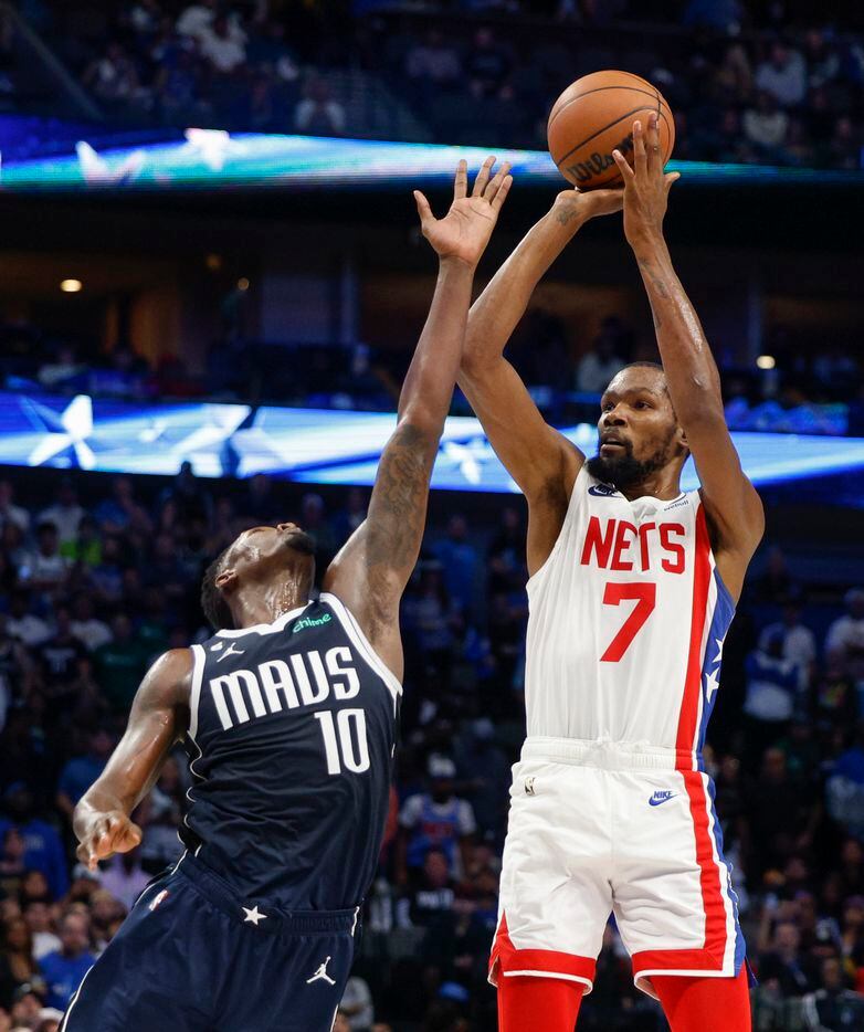 Brooklyn Nets forward Kevin Durant (7) shoots over Dallas Mavericks forward Dorian...