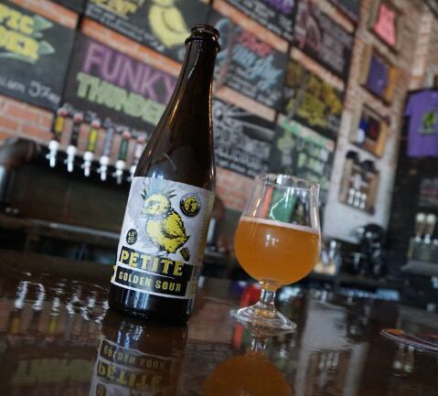 "Petite Golden Sour" is a popular beer at the Collective Brewing Project in Fort Worth,...