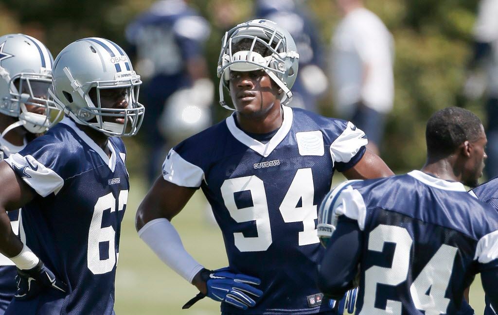 Dallas Cowboys defensive end Randy Gregory (94) looks on during an NFL football organized...