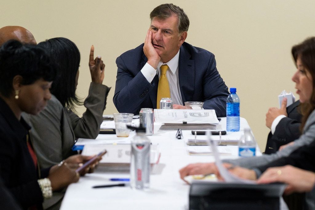 Dallas Mayor Mike Rawlings meets with his staff before an offsite City Council meeting at the Kleberg-Rylie Recreation Center  on May 8, 2019, in Dallas. (Smiley N. Pool/The Dallas Morning News) 