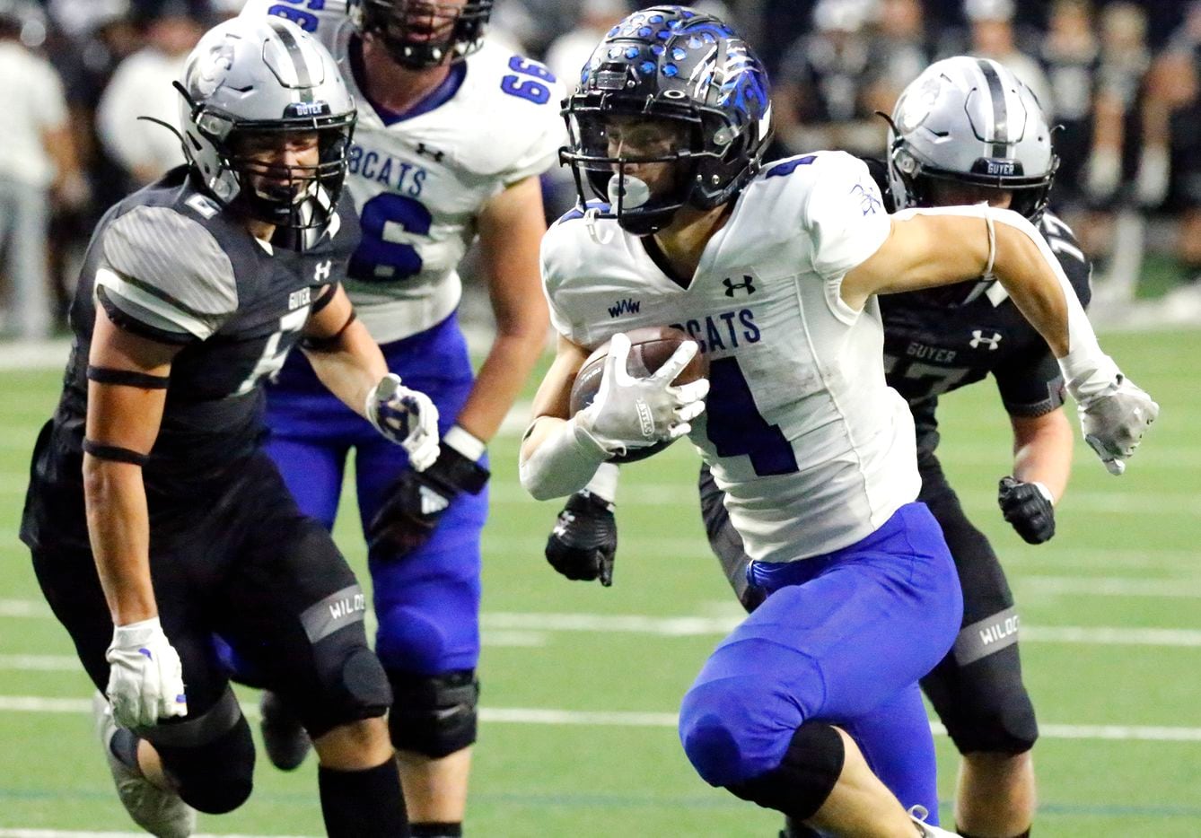 Byron Nelson High School running back Michael Giordano (4) outruns Guyer High School linebacker Wally Sagui (6) and Guyer High School linebacker Brooks Etheridge (17) to the end zone during the first half as Denton Guyer High School played Trophy Club Byron Nelson High School in a Class 6A Division II Region I semifinal football game at The Ford Center in Frisco on Saturday, November 27, 2021. (Stewart F. House/Special Contributor)