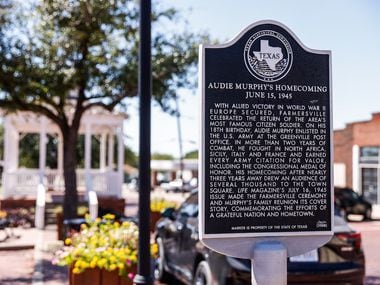 A historic marker in downtown Farmersville describes Audie Murphy's homecoming.