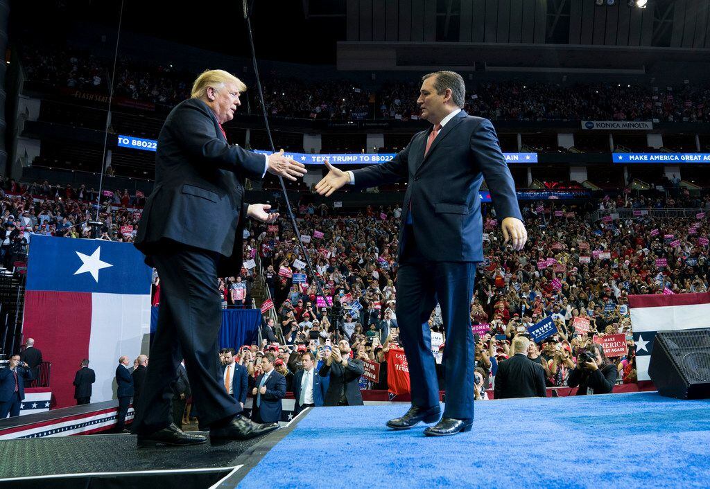 President Donald Trump shakes hands with Sen. Ted Cruz (R-Texas), during a campaign rally for Cruz and other Texas Republicans in Houston, Oct. 22, 2018. (Doug Mills/The New York Times)