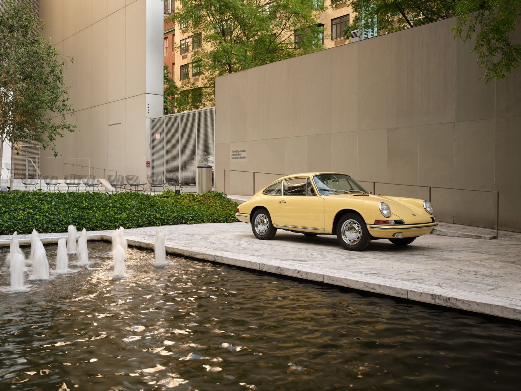 A 1965 Porsche 911 is on display at the Museum of Modern Art, part of the New York institution "Automania" exposure.