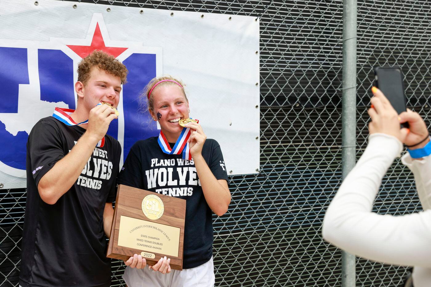 Plano West’s Dmitri Goubin and Summer Shannon pose for photos with their 6A mixed doubles...