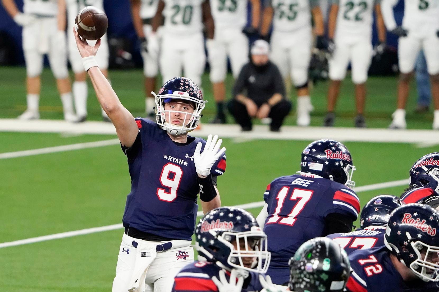 Denton Ryan quarterback Seth Henigan (9) throws a touchdown pass to Ja'Tavion Sanders during the second half of the Class 5A Division I state football championship game against Cedar Park at AT&T Stadium on Friday, Jan. 15, 2021, in Arlington, Texas. Ryan won the game 59-14. (Smiley N. Pool/The Dallas Morning News)