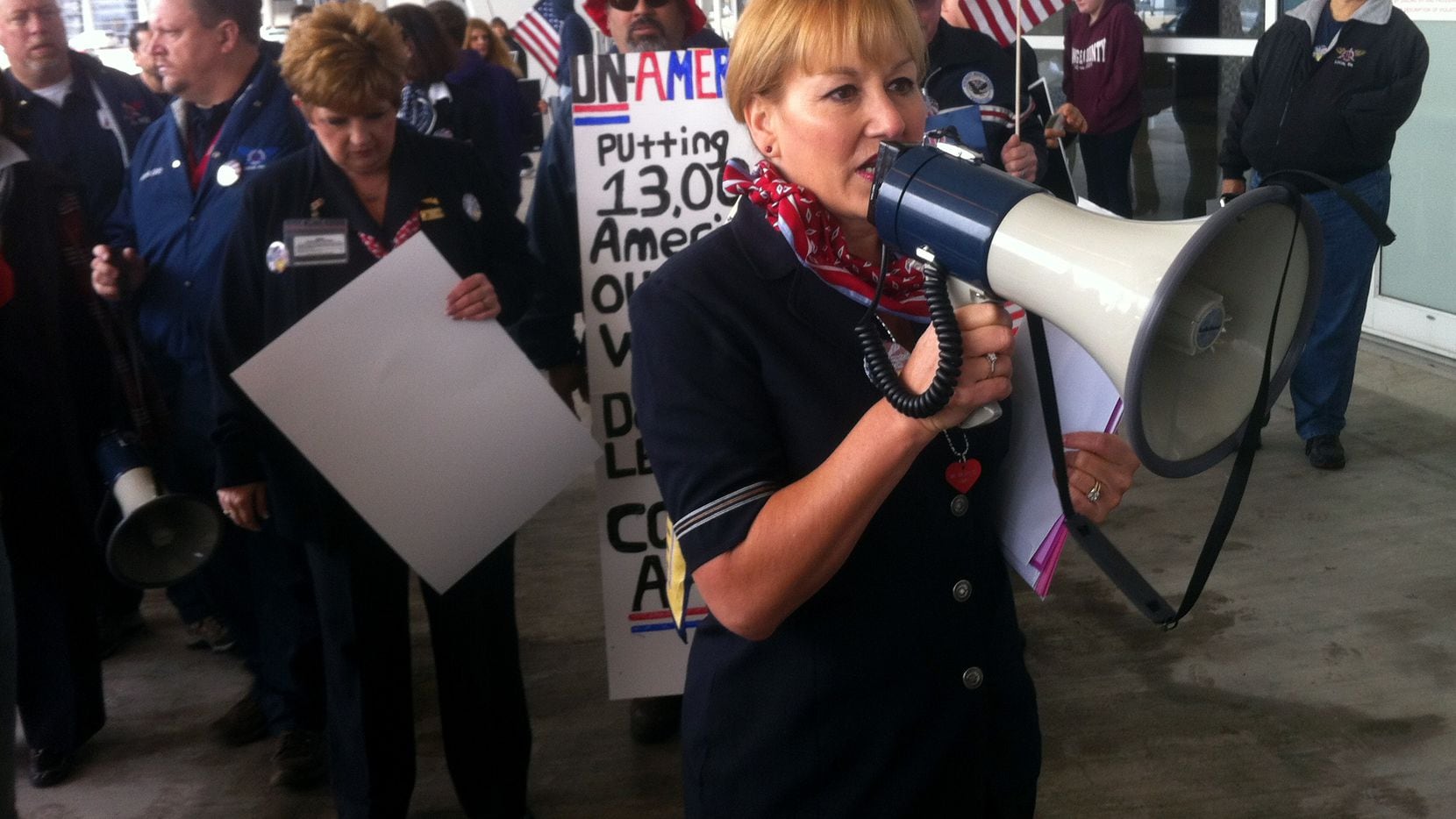 Lori Bassani, who heads the flight attendants union at American Airlines, led a protest in...