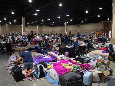 Hundreds of people gathered Friday in an emergency shelter at the Miami-Dade County Fair...