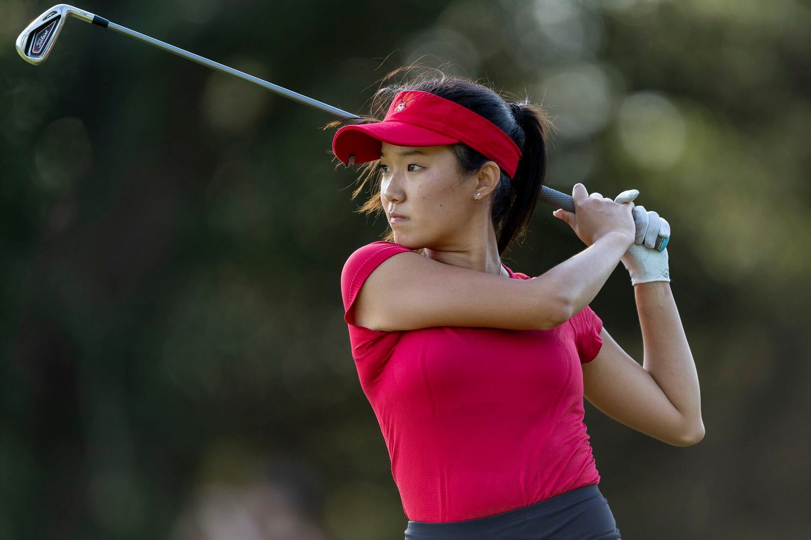 Colleyville Heritage Cindey Xiao hits from the 3rd tee box during the 5A girls state golf...