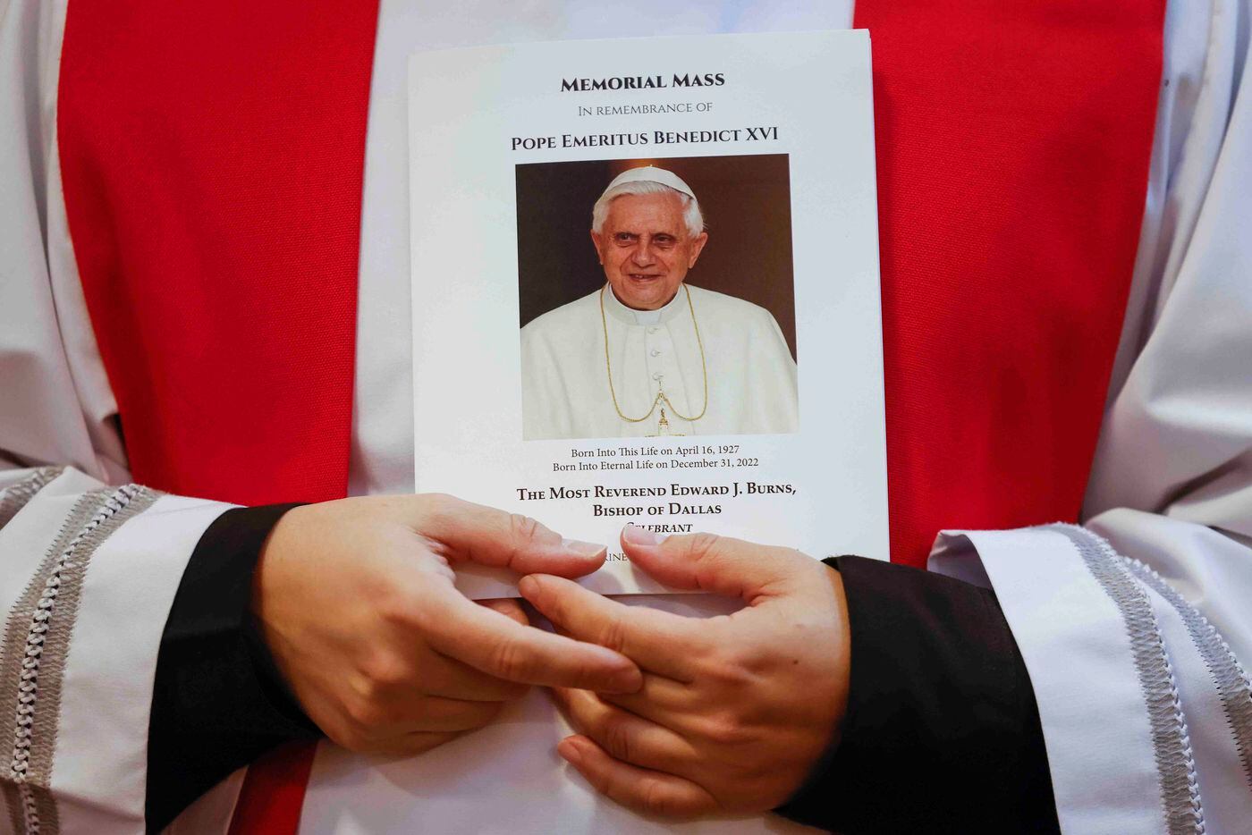 The brochure for a memorial mass for late Pope Emeritus Benedict XVI at Cathedral Shrine of...