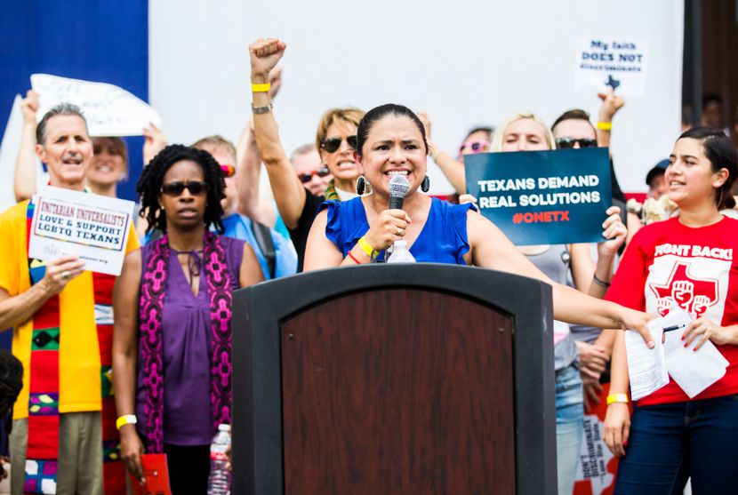 Montserrat Garibay, vice president of Education Austin, speaks during a rally at the steps...