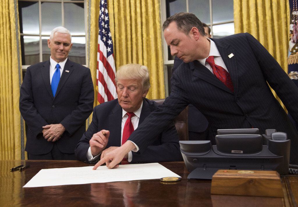 President Donald Trump signed confirmations for his first two Cabinet members, Defense...