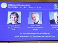 The three winners of the Nobel Prize for chemistry are shown at a press conference at The...