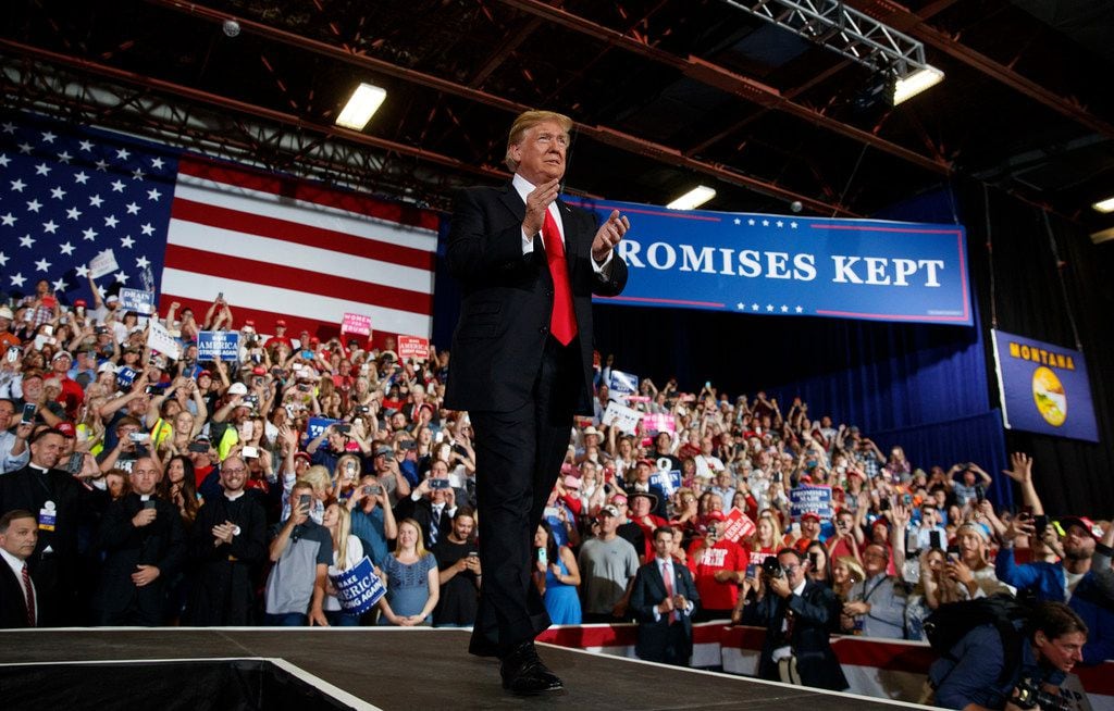 President Donald Trump arrives to speak during a rally at the Four Seasons Arena at Montana...