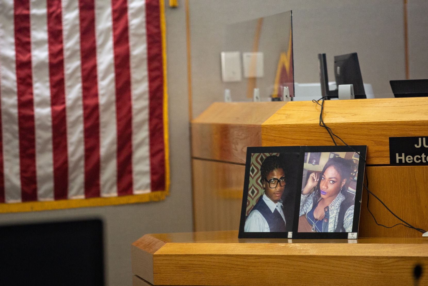 Photos of Chynal Lindsey sit on the judges stand during Ruben Alvarado’s trial for the murder of Lindsey at the Frank Crowley Criminal Courts in Dallas, TX on November 8, 2021. Lindsey, a transgender woman, was found dead in White Rock Lake on June 1, 2019. (Shelby Tauber/Special Contributor)
