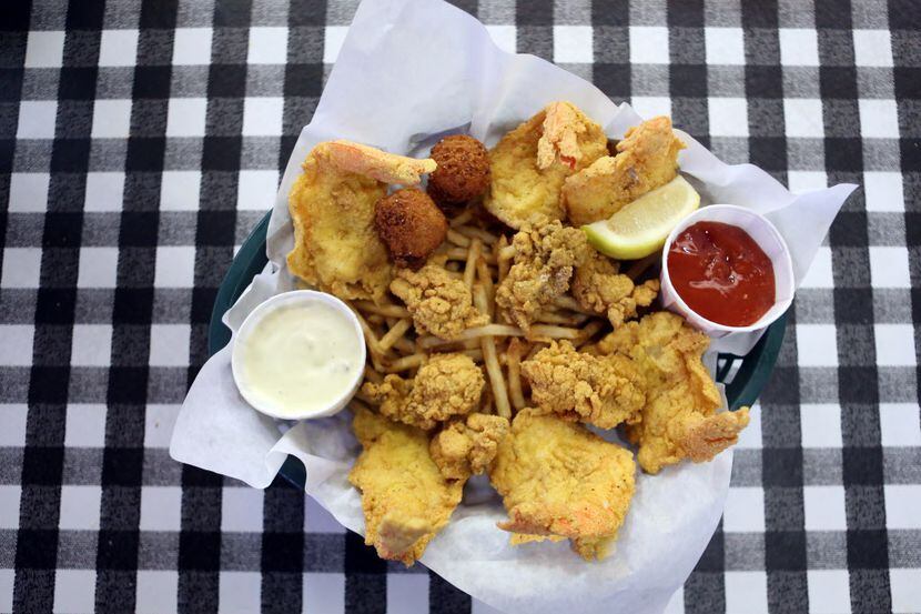 A shrimp and oyster basket is shown at Flying Fish, in Dallas, Texas, Thursday, June 7, 2013.