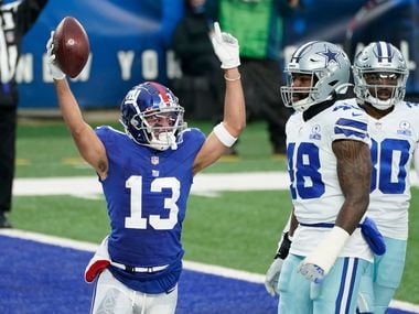 New York Giants' Dante Pettis, center, celebrates his touchdown during the first half of an NFL football game against the Dallas Cowboys, Sunday, Jan. 3, 2021, in East Rutherford, N.J.