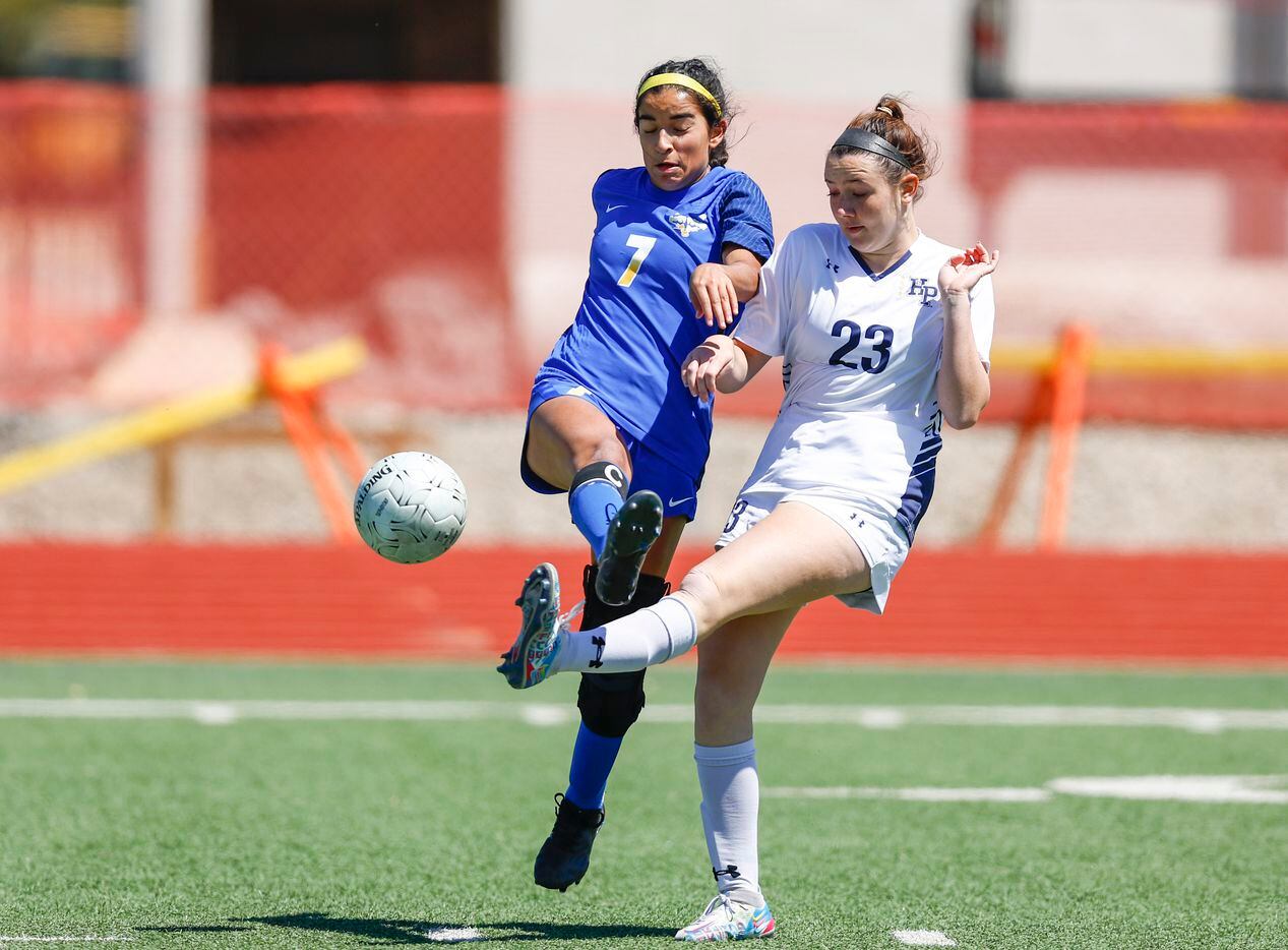 Frisco’s Luci Rodriguez (7) and Highland Park’s Isabella Davis (23) battle for the ball...