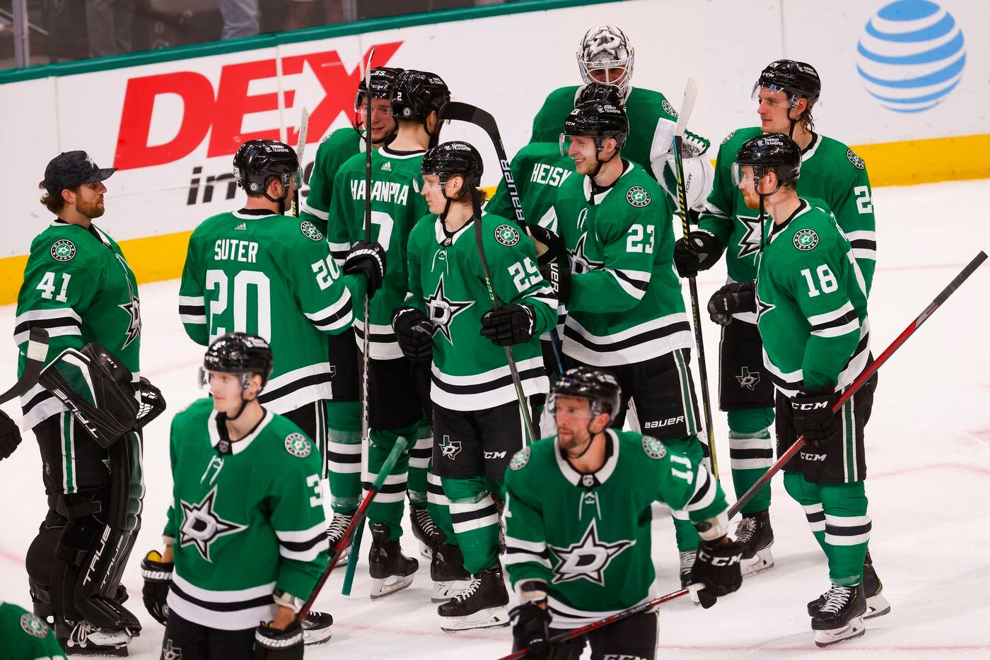 Dallas Stars celebrate defeating the Vegas Golden Knights following the shootout period of a...