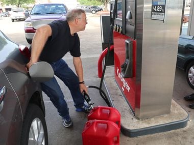 avid McWherter pumps gas at the Kroger  in Beaumont Texas, August 31, 2017. (Rick...