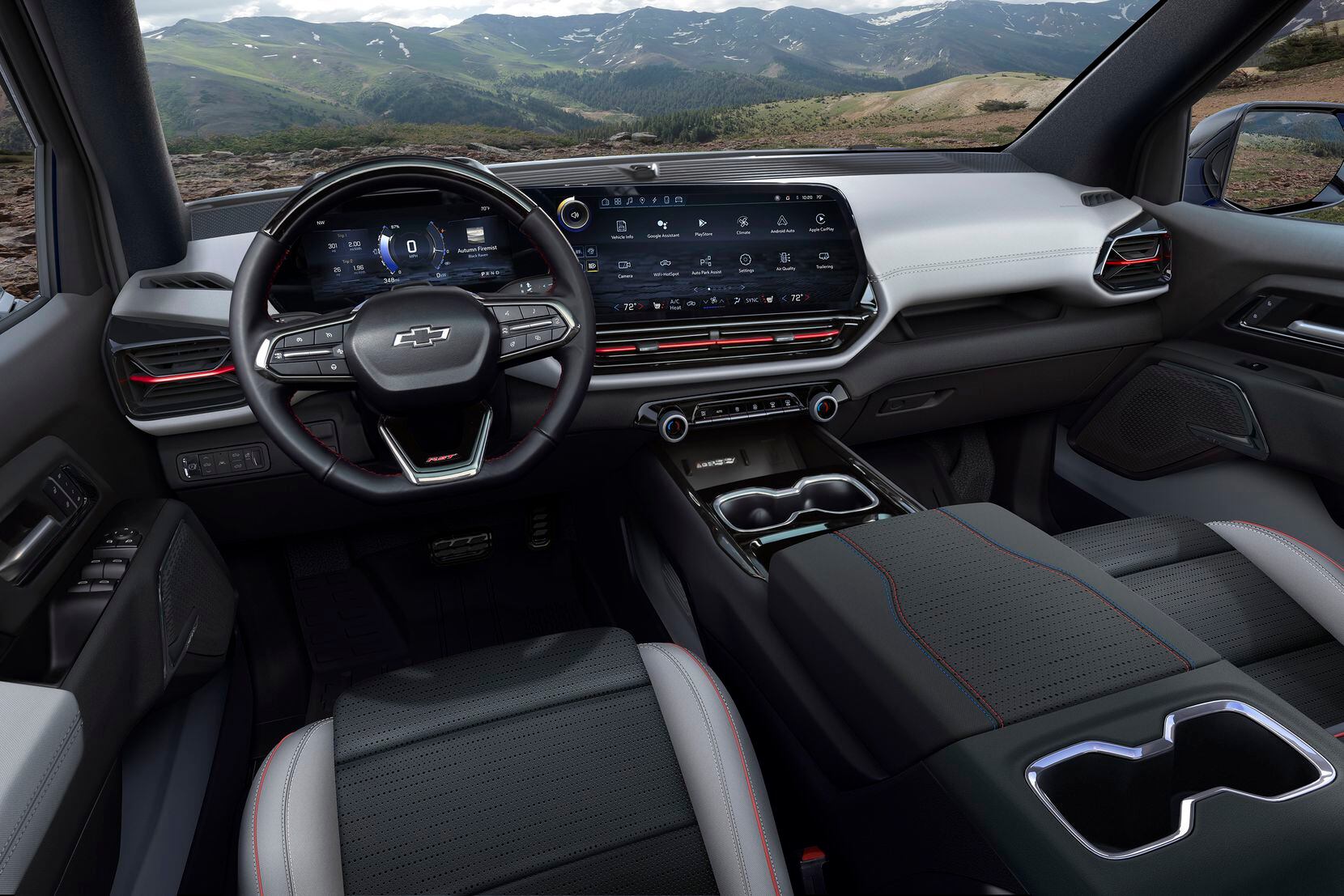The interior of the 2024 Silverado EV RST features 11-inch and 17-inch screens, 7 gallons of...