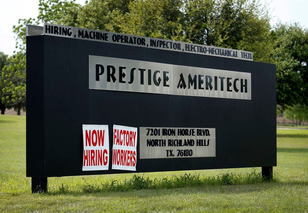 The main Prestige Ameritech promotes 'Now Hiring Factory Workers" at its location in North Richland Hills, on April 1, 2020. Prestige Ameritech is the largest mask maker in America.