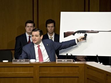 Senate Judiciary Committee member, freshman Senator Ted Cruz, R-Texas uses a life-size photo of...