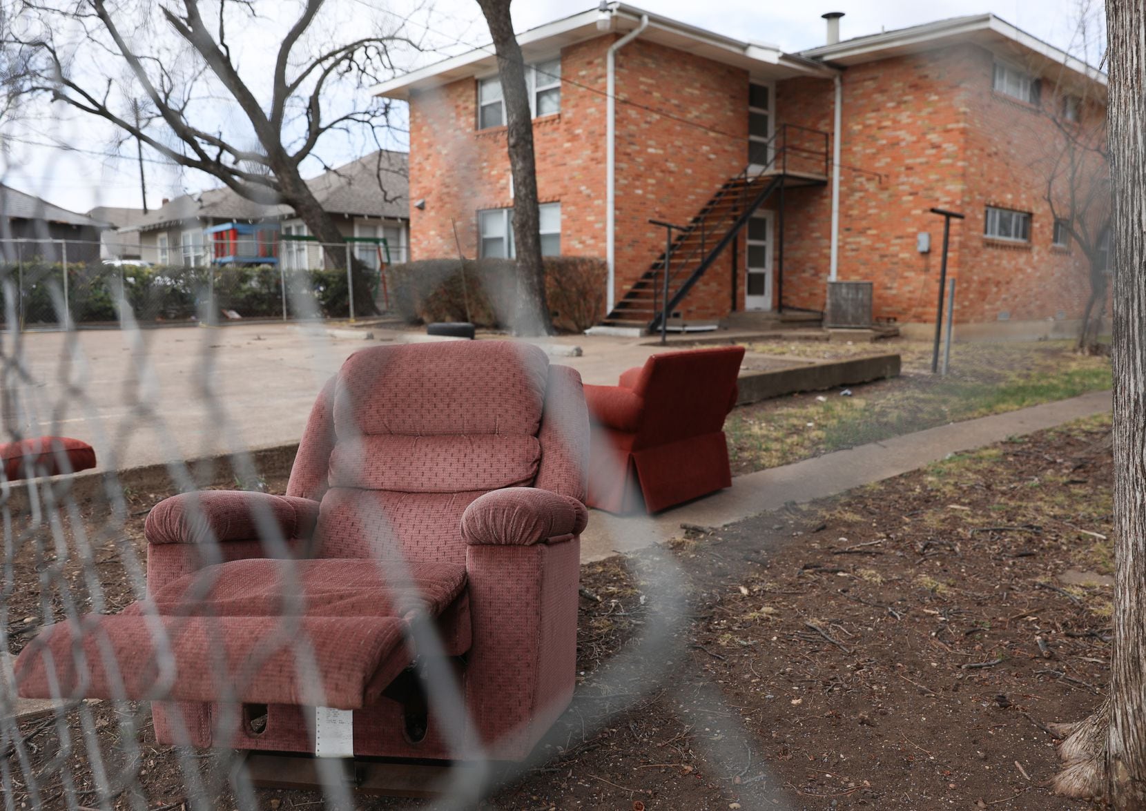 Some breaks on the fence along West Eighth Street between Llewellyn and Adams were offered ...