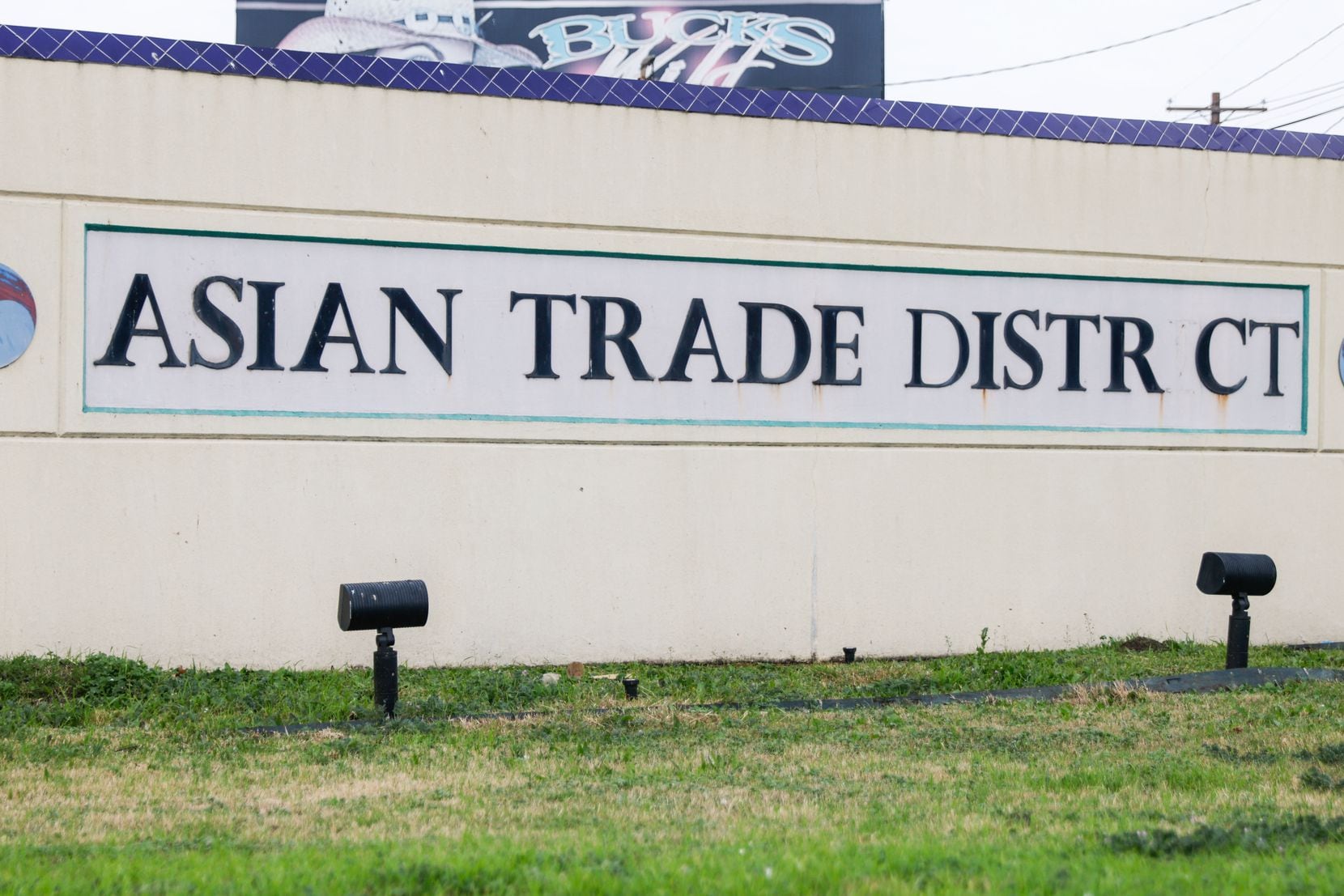 The Asian Trade District signs in Dallas, one of which is missing a letter, were envisioned...
