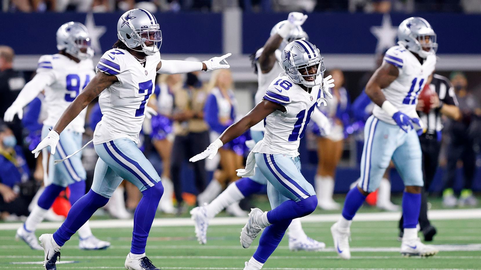 Dallas Cowboys strong safety Damontae Kazee (18) and Trevon Diggs (7) celebrate an early...