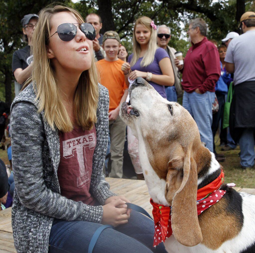 Carly Shrout of Carrollton and her basset hound Molly won first place in the howling contest...