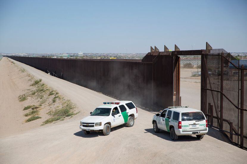 Border Patrol agents along the wall between El Paso, Texas, and Ciudad Juarez, Mexico. (Ivan...