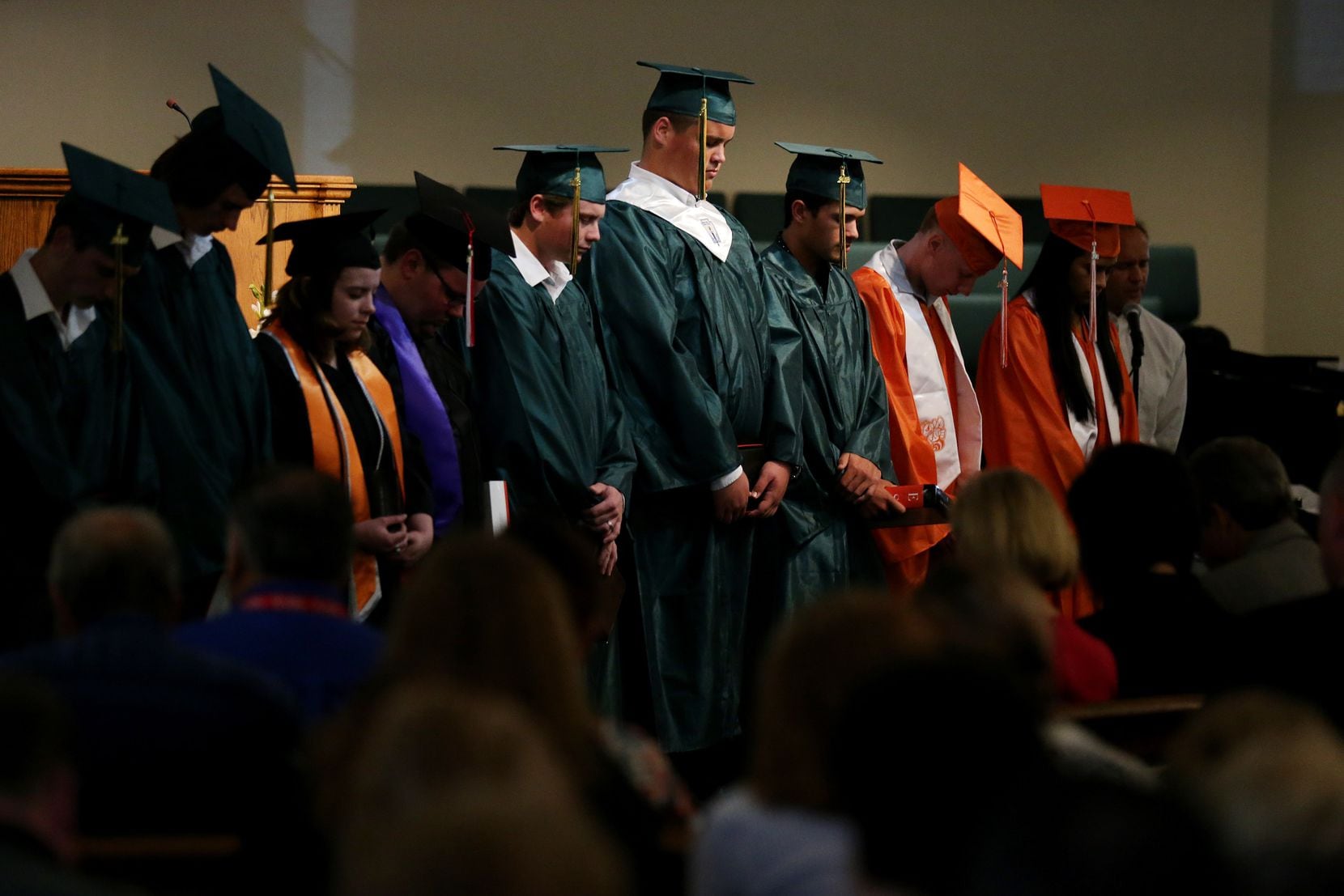 Graduating high school seniors are recognized during worship service at Arcadia First...