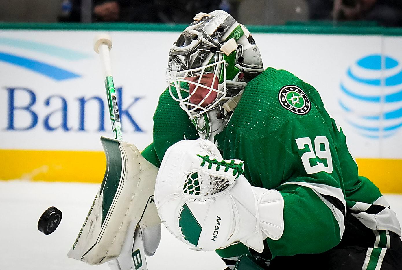 Dallas Stars goaltender Jake Oettinger make a save during the second period of an NHL hockey...