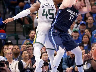 Dallas Mavericks guard Luka Doncic (77) pulls down a defensive rebound against Utah Jazz...