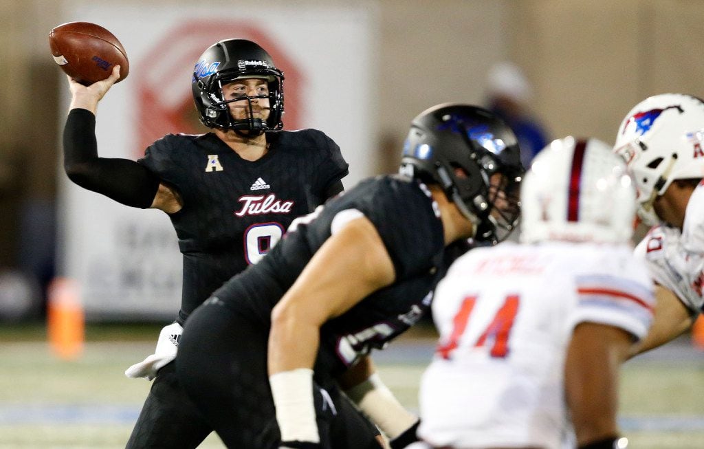 Tulsa quarterback Dane Evans (9) throws in the first quarter of an NCAA college football...