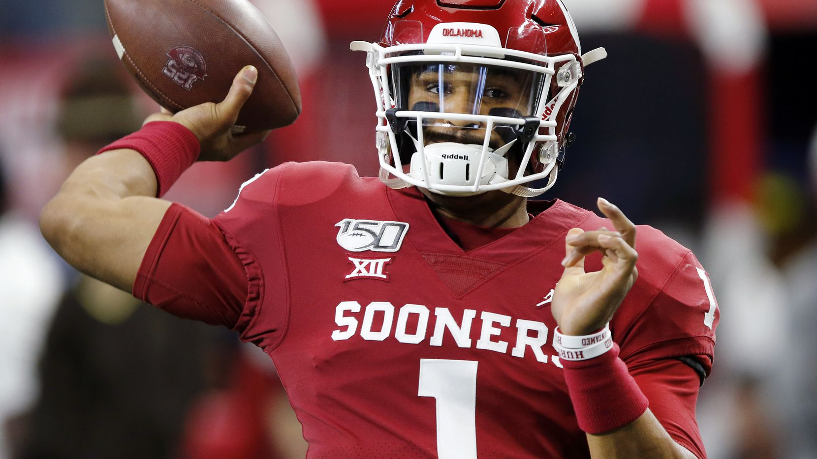 Oklahoma Sooners quarterback Jalen Hurts (1)  warms up his arm before facing the Baylor Bears in the Big 12 Championship at AT&T Stadium in Arlington, Saturday, December 7, 2019.