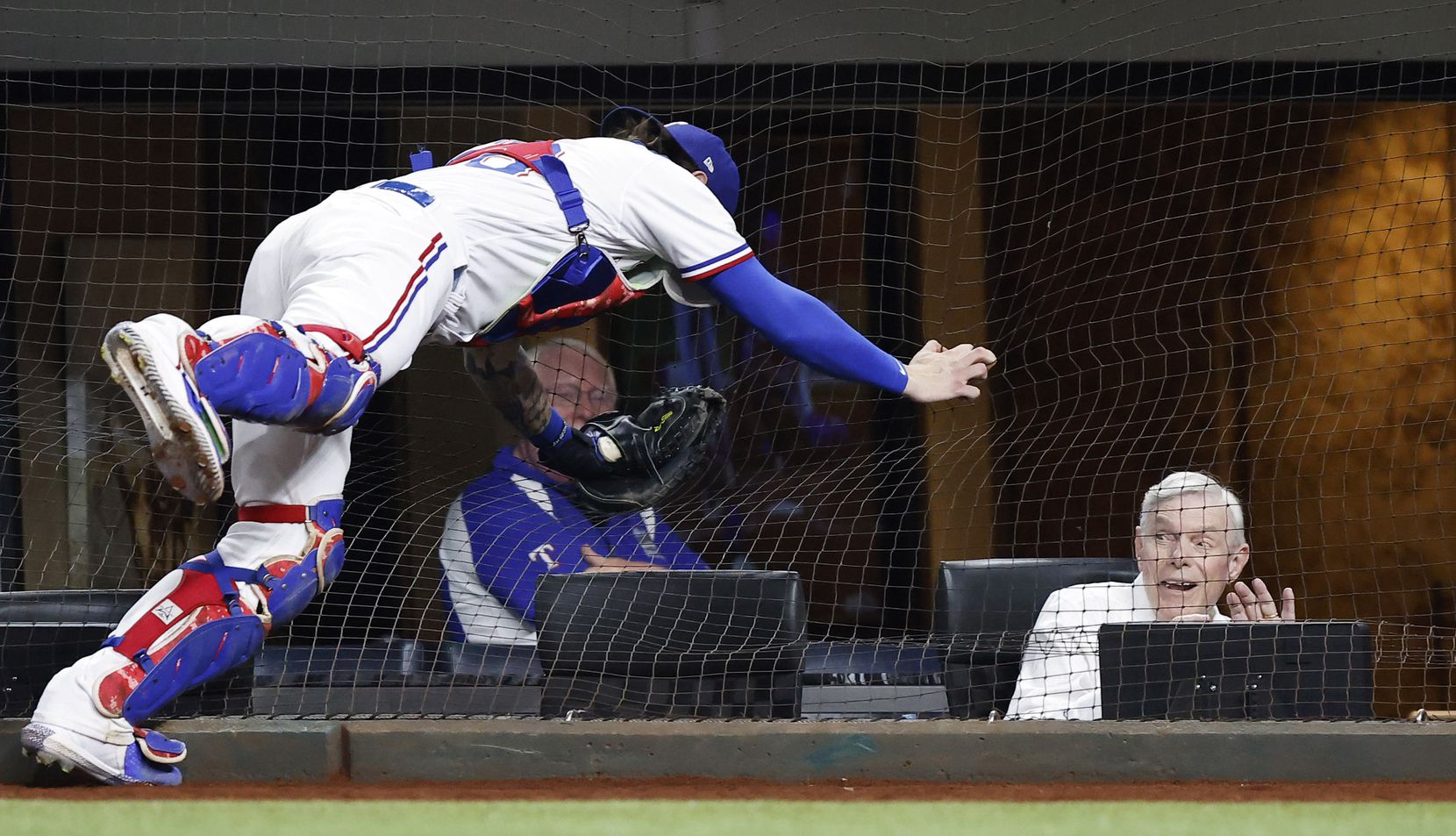 Texas Rangers co-chairman Ray C. Davis reacted as catcher Jonah Heim went into the netting after a foul ball in a game against the Oakland Athletics in August at Globe Life Field.